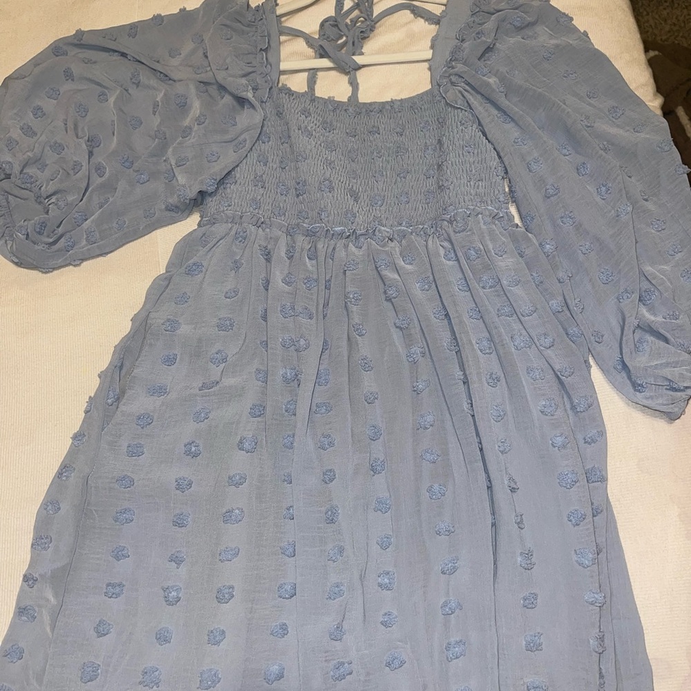 Light blue boutique dress. SIZE:medium NEVER WORN